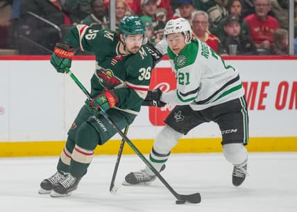 Mar 6, 2022; Saint Paul, Minnesota, USA; Minnesota Wild right wing Mats Zuccarello (36) and Dallas Stars left wing Jason Robertson (21) at Xcel Energy Center. Mandatory Credit: Matt Blewett-USA TODAY Sports