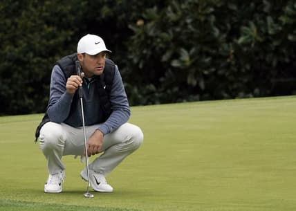 Apr 9, 2022; Augusta, Georgia, USA; Scottie Scheffler lines up a putt on no .5 during the third round of The Masters golf tournament at Augusta National Golf Club. Mandatory Credit: Katie Goodale-Augusta Chronicle/USA TODAY Sports