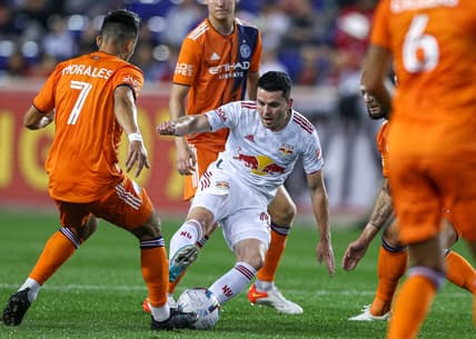 Jun 22, 2022; Harrison, NJ, United States; New York Red Bulls midfielder Lewis Morgan (10) plays the ball asNew York City FC midfielder Alfredo Morales (7) defends during the first half at Red Bull Arena. Mandatory Credit: Vincent Carchietta-USA TODAY Sports