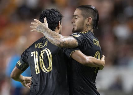 Aug 31, 2022; Houston, Texas, USA;  Los Angeles FC forward Carlos Vela (10) celebrates forward Cristian Arango (9) goal against the Houston Dynamo FC in the first half at PNC Stadium. Mandatory Credit: Thomas Shea-USA TODAY Sports