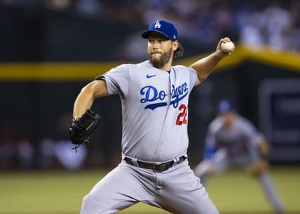 Sep 13, 2022; Phoenix, Arizona, USA; Los Angeles Dodgers pitcher Clayton Kershaw (22) throws in the first inning against the Arizona Diamondbacks at Chase Field. Mandatory Credit: Mark J. Rebilas-USA TODAY Sports