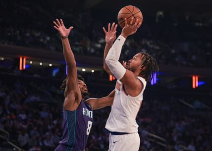Oct 26, 2022; New York, New York, USA; New York Knicks guard Jalen Brunson (11) shoots the ball as Charlotte Hornets guard Dennis Smith Jr. (8) defends during the first half at Madison Square Garden. Mandatory Credit: Vincent Carchietta-USA TODAY Sports