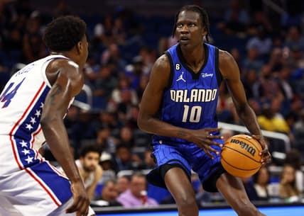 Nov 27, 2022; Orlando, Florida, USA; Orlando Magic center Bol Bol (10) drives to the basket as Philadelphia 76ers forward Paul Reed (44) defends during the second half at Amway Center. Mandatory Credit: Kim Klement-USA TODAY Sports
