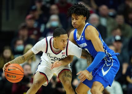 Jan 7, 2023; Storrs, Connecticut, USA; UConn Huskies guard Jordan Hawkins (24) dribbles the ball against Creighton Bluejays guard Trey Alexander (23) in the second half at Harry A. Gampel Pavilion. Mandatory Credit: David Butler II-USA TODAY Sports