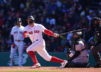 Apr 2, 2023; Boston, Massachusetts, USA; Boston Red Sox center fielder Adam Duvall (18) hits a double against the Baltimore Orioles in the third inning at Fenway Park. Mandatory Credit: David Butler II-USA TODAY Sports