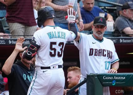 April 22, 2023; Phoenix, Ariz.; USA; Diamondbacks manager Torey Lovullo (R) greets Christian Walker (53) and Corbin Carroll (7) after a Walker two-run home run against the Padres in the third inning during a game at Chase Field.

Mlb Padres At D Backs