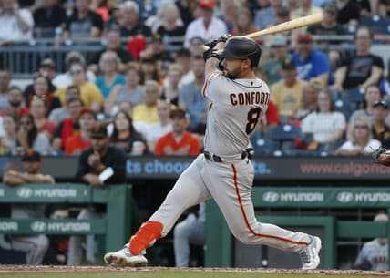 Jul 14, 2023; Pittsburgh, Pennsylvania, USA; San Francisco Giants right fielder Michael Conforto (8) hits a two run single against the Pittsburgh Pirates during the fifth inning  at PNC Park. Mandatory Credit: Charles LeClaire-USA TODAY Sports