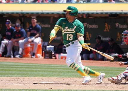 Jul 19, 2023; Oakland, California, USA; Oakland Athletics second baseman Jordan Diaz (13) hits a single against the Boston Red Sox during the fifth inning at Oakland-Alameda County Coliseum. Mandatory Credit: Kelley L Cox-USA TODAY Sports