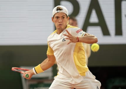 May 30, 2023; Paris,France; Sebastian Baez (ARG) returns a shot during his match against Gael Monfils (FRA) on day three at Stade Roland-Garros. Mandatory Credit: Susan Mullane-USA TODAY Sports