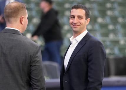 David Stearns on the field in Milwaukee before a game in 2022.