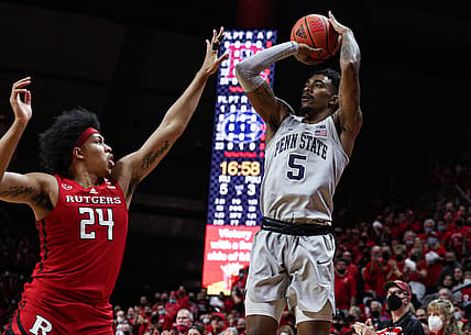 Mar 6, 2022; Piscataway, New Jersey, USA; Penn State Nittany Lions forward Greg Lee (5) shoots the ball as Rutgers Scarlet Knights forward Ron Harper Jr. (24) defends during the first half at Jersey Mike's Arena. Mandatory Credit: Vincent Carchietta-USA TODAY Sports
