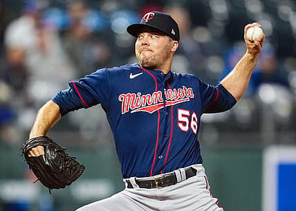Apr 20, 2022; Kansas City, Missouri, USA; Minnesota Twins relief pitcher Caleb Thielbar (56) pitches against the Kansas City Royals during the sixth inning at Kauffman Stadium. Mandatory Credit: Jay Biggerstaff-USA TODAY Sports