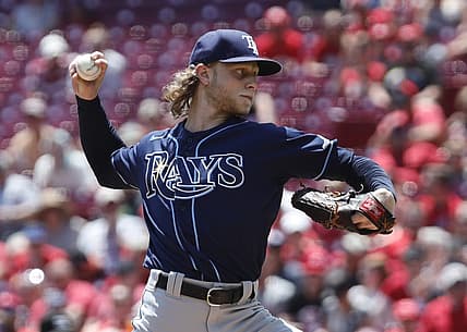 Jul 10, 2022; Cincinnati, Ohio, USA; Tampa Bay Rays starting pitcher Shane Baz (11) throws a pitch against the Cincinnati Reds during the first inning at Great American Ball Park. Mandatory Credit: David Kohl-USA TODAY Sports