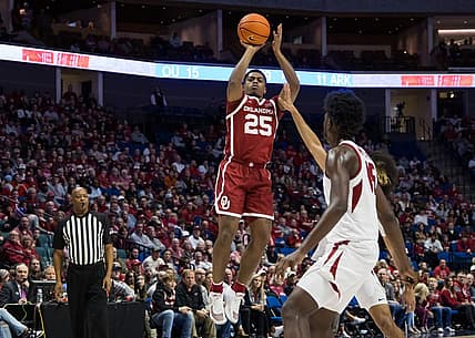 Dec 10, 2022; Tulsa, Oklahoma, USA;  Oklahoma Sooners guard Grant Sherfield (25) takes a shot during the first half against the Arkansas Razorbacks at BOK Center. Arkansas won 88-78. Mandatory Credit: Brett Rojo-USA TODAY Sports