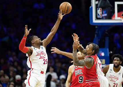Mar 20, 2023; Philadelphia, Pennsylvania, USA; Philadelphia 76ers forward Danuel House Jr. (25) tips the ball past Chicago Bulls forward DeMar DeRozan (11) during the second quarter at Wells Fargo Center. Mandatory Credit: Bill Streicher-USA TODAY Sports