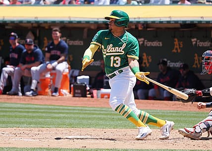 Jul 19, 2023; Oakland, California, USA; Oakland Athletics second baseman Jordan Diaz (13) hits a single against the Boston Red Sox during the fifth inning at Oakland-Alameda County Coliseum. Mandatory Credit: Kelley L Cox-USA TODAY Sports