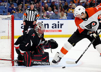 Nov 3, 2023; Buffalo, New York, USA;  Buffalo Sabres goaltender Ukko-Pekka Luukkonen (1) looks to make a save on Philadelphia Flyers right wing Tyson Foerster (71) during the first period at KeyBank Center. Mandatory Credit: Timothy T. Ludwig-USA TODAY Sports