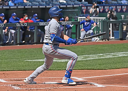 Apr 3, 2021; Kansas City, Missouri, USA; Texas Rangers right fielder Joey Gallo (13) hits a two run home run during the first inning against the Kansas City Royals at Kauffman Stadium. Mandatory Credit: Peter Aiken-USA TODAY Sports