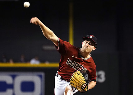 Apr 11, 2021; Phoenix, Arizona, USA; Arizona Diamondbacks starting pitcher Luke Weaver (24) throws against the Cincinnati Reds during a baseball game at Chase Field. Mandatory Credit: Rick Scuteri-USA TODAY Sports