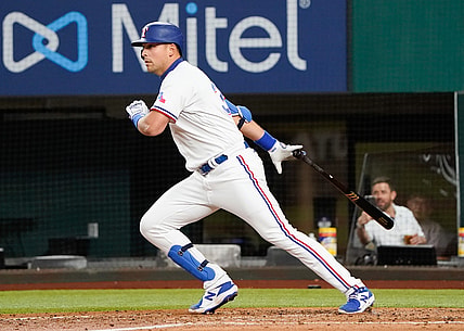 Apr 17, 2021; Arlington, Texas, USA; Texas Rangers first baseman Nate Lowe (30) runs to first base on his single against the Baltimore Orioles at Globe Life Field. Mandatory Credit: Jim Cowsert-USA TODAY Sports