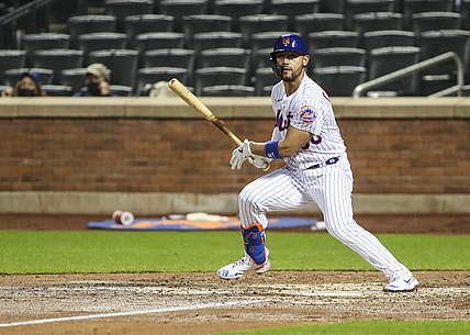 Apr 27, 2021; New York City, New York, USA; New York Mets right fielder Michael Conforto (30) watches his double during the fourth inning against the Boston Red Sox at Citi Field. Mandatory Credit: Wendell Cruz-USA TODAY Sports