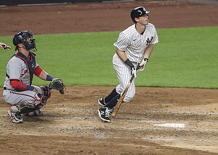 May 7, 2021; Bronx, New York, USA;  New York Yankees third baseman DJ LeMahieu (26) hits a game tying solo home run in the sixth inning against the Washington Nationals at Yankee Stadium. Mandatory Credit: Wendell Cruz-USA TODAY Sports