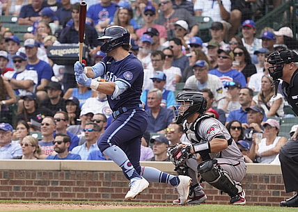 Jul 23, 2021; Chicago, Illinois, USA; Chicago Cubs second baseman Nico Hoerner (2)  hits a two run single against the Arizona Diamondbacks during the third inning at Wrigley Field. Mandatory Credit: David Banks-USA TODAY Sports