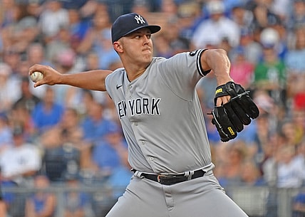 Aug 9, 2021; Kansas City, Missouri, USA;  New York Yankees starting pitcher Jameson Taillon (50) delivers against the Kansas City Royals during the first inning at Kauffman Stadium. Mandatory Credit: Peter Aiken-USA TODAY Sports