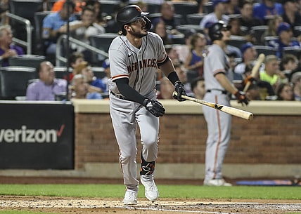 Aug 25, 2021; New York City, New York, USA;  San Francisco Giants third baseman Kris Bryant (23) hits a solo home run in the fourth inning against the New York Mets at Citi Field. Mandatory Credit: Wendell Cruz-USA TODAY Sports