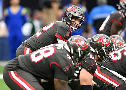 Sep 26, 2021; Inglewood, California, USA;   Tampa Bay Buccaneers quarterback Tom Brady (12) takes a snap in the first half of the game against the Los Angeles Rams at SoFi Stadium. Mandatory Credit: Jayne Kamin-Oncea-USA TODAY Sports