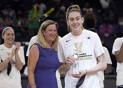 Aug 12, 2021; Phoenix, Arizona, USA; WNBA commissioner Cathy Engelbert and Seattle Storm forward Breanna Stewart (30) pose with the MVP trophy after a victory by Seattle over the Connecticut Sun during the Inaugural WNBA Commissioners Cup Championship Game at Footprint Center. Mandatory Credit: Rick Scuteri-USA TODAY Sports