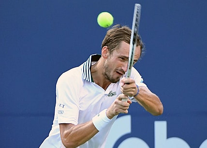 Aug 12, 2021; Toronto, Ontario, Canada;  Daniil Medvedev of Russia plays a shot against James Duckworth of Australia during fourth round play in the National Bank Open at Aviva Centre. Mandatory Credit: Dan Hamilton-USA TODAY Sports