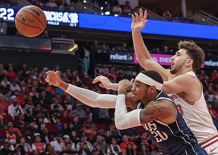 Dec 22, 2023; Houston, Texas, USA; Houston Rockets center Alperen Sengun (28) and Dallas Mavericks forward Richaun Holmes (20) reach for a rebound in the second quarter at Toyota Center. Mandatory Credit: Thomas Shea-USA TODAY Sports