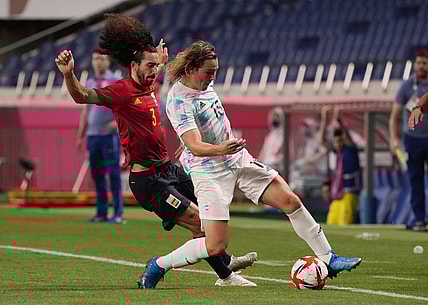 Jul 28, 2021; Saitama, Japan; Team Argentina forward Pedro de la Vega (15) battles for the ball with Team Spain defender Marc Cucurella (3) during the Tokyo 2020 Olympic Summer Games at Saitama Stadium. Mandatory Credit: Jack Gruber-USA TODAY Sports