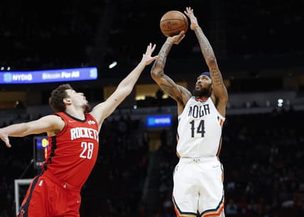 Feb 6, 2022; Houston, Texas, USA; New Orleans Pelicans forward Brandon Ingram (14) shoots the ball as Houston Rockets center Alperen Sengun (28) defends during the first quarter at Toyota Center. Mandatory Credit: Troy Taormina-USA TODAY Sports