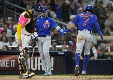 Jun 2, 2023; San Diego, California, USA; Chicago Cubs shortstop Dansby Swanson (7) scores after hitting a home run against the San Diego Padres during the fifth inning at Petco Park. Mandatory Credit: Ray Acevedo-USA TODAY Sports