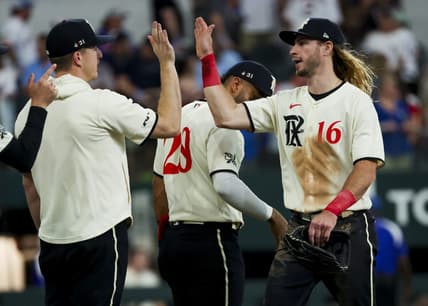 Jul 1, 2023; Arlington, Texas, USA;  Texas Rangers left fielder Travis Jankowski (16) celebrates with teammates after the game against the Houston Astros at Globe Life Field. Mandatory Credit: Kevin Jairaj-USA TODAY Sports