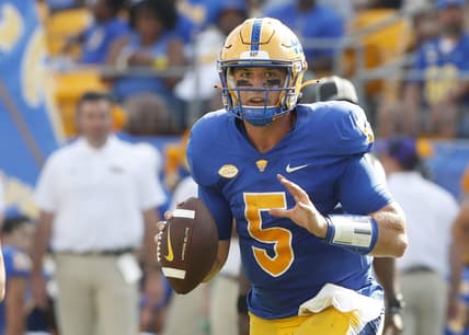 Sep 2, 2023; Pittsburgh, Pennsylvania, USA; Pittsburgh Panthers quarterback Phil Jurkovec (5) scrambles with the ball against the Wofford Terriers during the second quarter at Acrisure Stadium. Mandatory Credit: Charles LeClaire-USA TODAY Sports
