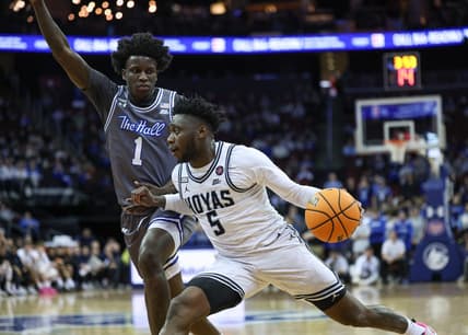 Feb 7, 2024; Newark, New Jersey, USA; Georgetown Hoyas guard Jay Heath (5) dribbles against Seton Hall Pirates guard Kadary Richmond (1) during the first half at Prudential Center. Mandatory Credit: Vincent Carchietta-USA TODAY Sports