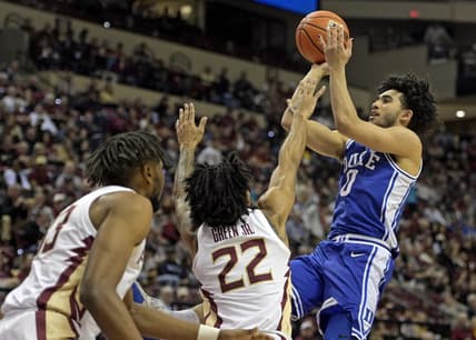 Feb 17, 2024; Tallahassee, Florida, USA; Duke Blue Devils guard Jared McCain (0) shoots the ball over Florida State Seminoles guard Darin Green Jr (22) during the second half at Donald L. Tucker Center. Mandatory Credit: Melina Myers-USA TODAY Sports