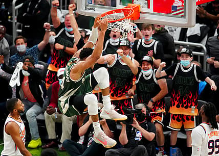 Jul 11, 2021; Milwaukee, Wisconsin, USA; Milwaukee Bucks forward Giannis Antetokounmpo (34) dunks against the Phoenix Suns during game three of the 2021 NBA Finals at Fiserv Forum. Mandatory Credit: Mark J. Rebilas-USA TODAY Sports