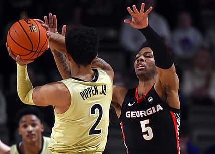 Jan 29, 2022; Nashville, Tennessee, USA; Georgia Bulldogs guard Christian Wright (5) defends Vanderbilt Commodores guard Scotty Pippen Jr. (2) during the first half at Memorial Gymnasium. Mandatory Credit: Christopher Hanewinckel-USA TODAY Sports
