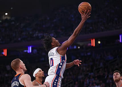 Mar 12, 2024; New York, New York, USA; Philadelphia 76ers guard Tyrese Maxey (0) shoots the ball against the New York Knicks New York Knicks guard Donte DiVincenzo (0) during the first quarter at Madison Square Garden. Mandatory Credit: Vincent Carchietta-USA TODAY Sports
