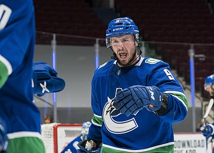 Mar 13, 2021; Vancouver, British Columbia, CAN; Vancouver Canucks forward J.T. Miller (9) celebrates the Canucks victory against the Edmonton Oilers in the third period at Rogers Arena.Canucks won 2-1.  Mandatory Credit: Bob Frid-USA TODAY Sports