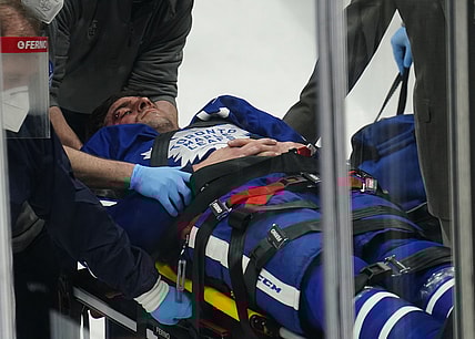 May 20, 2021; Toronto, Ontario, CAN; Toronto Maple Leafs  forward John Tavares (91) is taken off of the ice on a stretcher after a collision with Montreal Canadiens forward Corey Perry (not pictured) during the first period of game one of the first round of the 2021 Stanley Cup Playoffs at Scotiabank Arena. Mandatory Credit: John E. Sokolowski-USA TODAY Sports