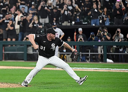 Oct 10, 2021; Chicago, Illinois, USA; Chicago White Sox relief pitcher Liam Hendriks (31) reacts after striking out Houston Astros second baseman Jose Altuve (not pictured) for the final out of the game during game three of the 2021 ALDS at Guaranteed Rate Field. Mandatory Credit: Matt Marton-USA TODAY Sports