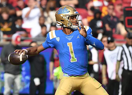 Nov 20, 2021; Los Angeles, California, USA; UCLA Bruins quarterback Dorian Thompson-Robinson (1) throws a pass against the Southern California Trojans in the first half at the Los Angeles Memorial Coliseum. Mandatory Credit: Richard Mackson-USA TODAY Sports