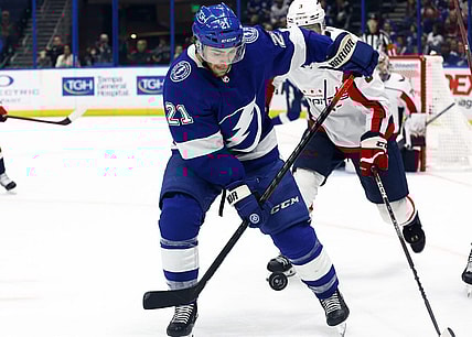Nov 13, 2022; Tampa, Florida, USA; Tampa Bay Lightning center Brayden Point (21) skates after the puck against the Washington Capitals during the third period at Amalie Arena. Mandatory Credit: Kim Klement-USA TODAY Sports