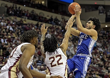 Feb 17, 2024; Tallahassee, Florida, USA; Duke Blue Devils guard Jared McCain (0) shoots the ball over Florida State Seminoles guard Darin Green Jr (22) during the second half at Donald L. Tucker Center. Mandatory Credit: Melina Myers-USA TODAY Sports