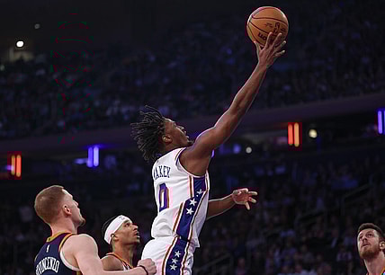 Mar 12, 2024; New York, New York, USA; Philadelphia 76ers guard Tyrese Maxey (0) shoots the ball against the New York Knicks New York Knicks guard Donte DiVincenzo (0) during the first quarter at Madison Square Garden. Mandatory Credit: Vincent Carchietta-USA TODAY Sports